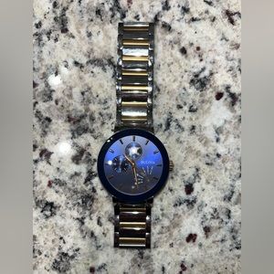 Bulova Men’s Watch. Has been worn. Few scratches on band. In good condition.